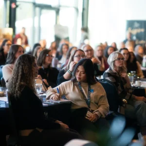 a group of women in a conference