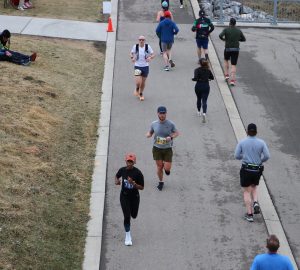 a group running outdoors in the fall