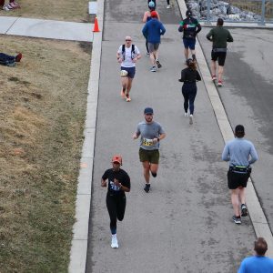 a group running outdoors in the fall