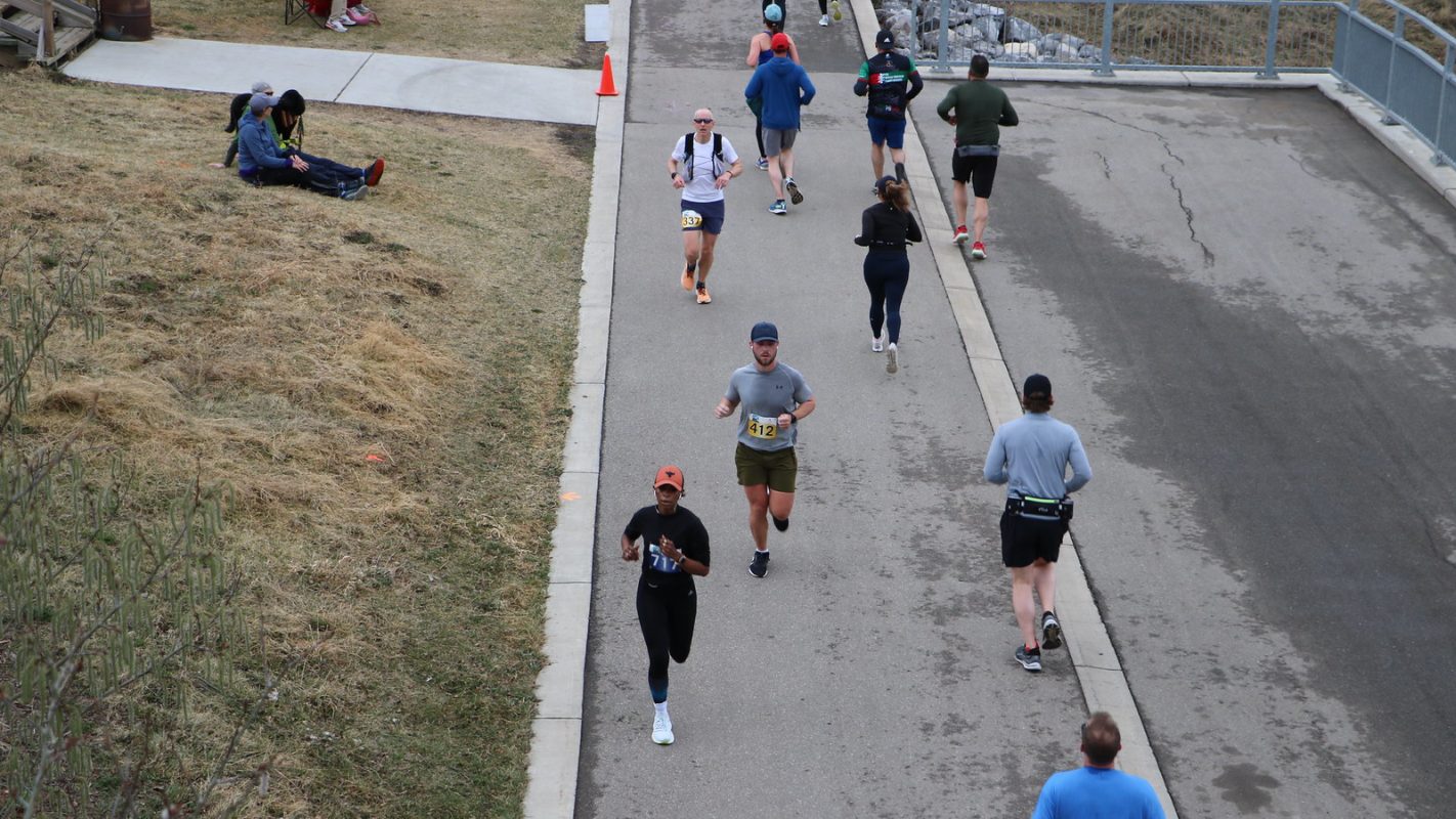 a group running outdoors in the fall