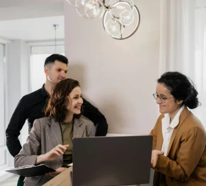 a family sitting with a counsellor